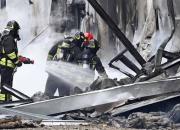 ۸ کشته بر اثر برخورد یک هواپیما با ساختمان در ایتالیا +عکس