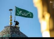 عکس/ تعویض پرچم گنبد حرم حضرت شاهچراغ(ع)