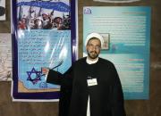 بحث داغ فرقه‌های انحرافی در نمایشگاه دفاع مقدس قم