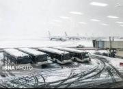 عکس/ وضعیت فرودگاه مهرآباد در روز برفی تهران