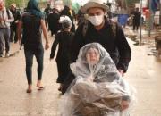  پیاده‌روی اربعین در باران +عکس