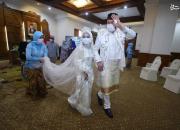 عکس/ برگزاری عروسی در زیرسایه کرونا