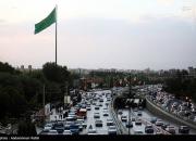 عکس/ اهتزاز پرچم بزرگ امام رضا(ع) در همدان