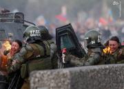 پذیرایی جالب پلیس شیلی از مردم معترض! +فیلم