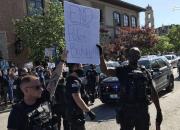عکس/ نیروهای پلیس به معترضان آمریکایی پیوستند