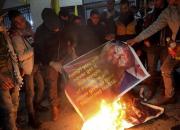 فلسطینی‌ها عکس «ترامپ» را آتش زدند