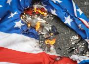 عکس/ آتش زدن پرچم آمریکا