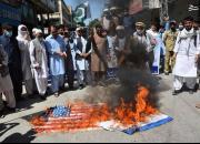 عکس/ آتش زدن پرچم اسرائیل و آمریکا در پاکستان