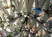 عکس/ پیاده‌روی با طناب روی بلندترین برج تلویزیونی- چین