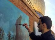 نقاشی واقعه کربلا در کنار حرم سفیر امام حسین(ع)+تصویر
