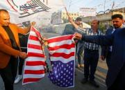 عکس/ مردم عراق پرچم آمریکا را به آتش کشیدند